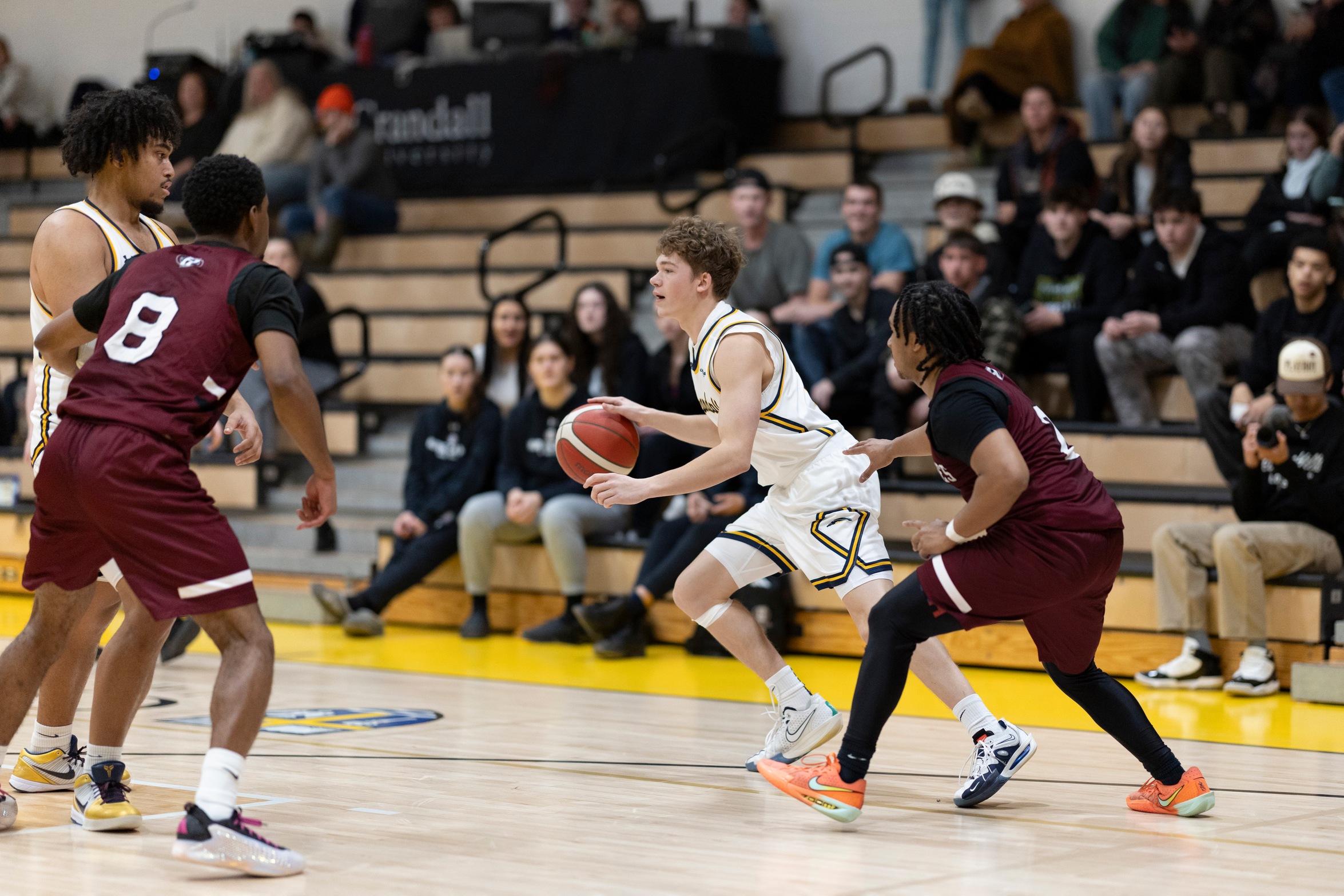 Holland Pulls Away Late to Defeat Crandall 74&ndash;60